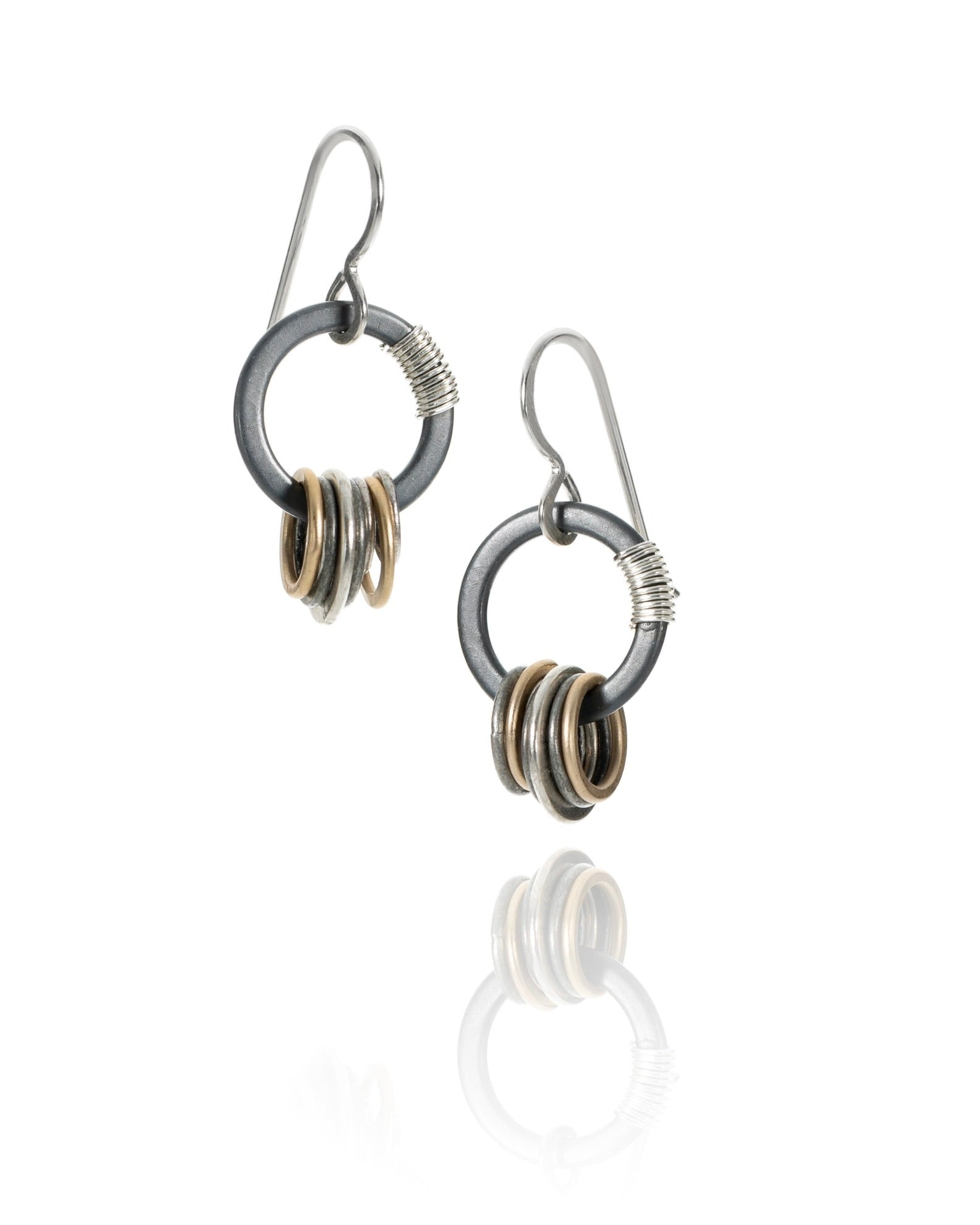 oxidized circle drop earrings in mixed metal electroplate
