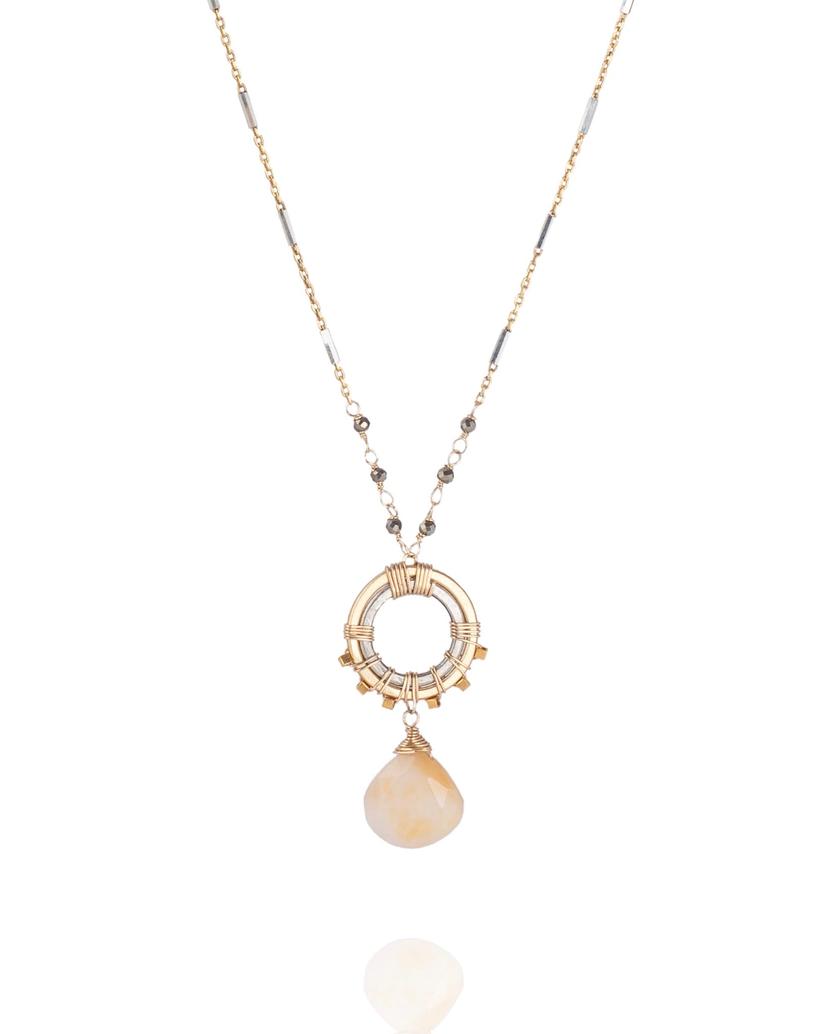 pendant necklace in pyrite with peach moonstone accents and mixed metal electroplate