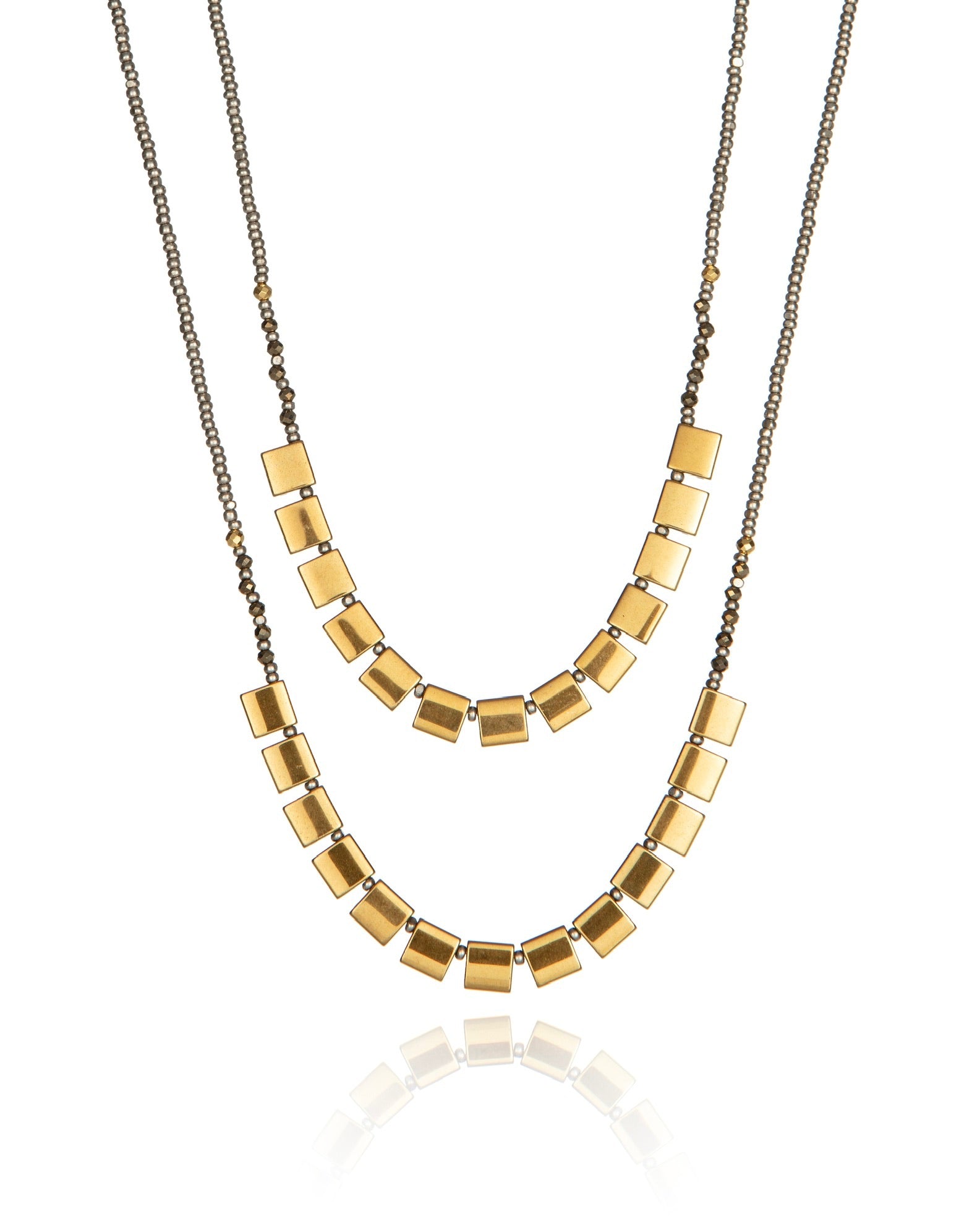 asymmetrical necklace in pyrite with antique silver electroplate chain and 24k gold accents