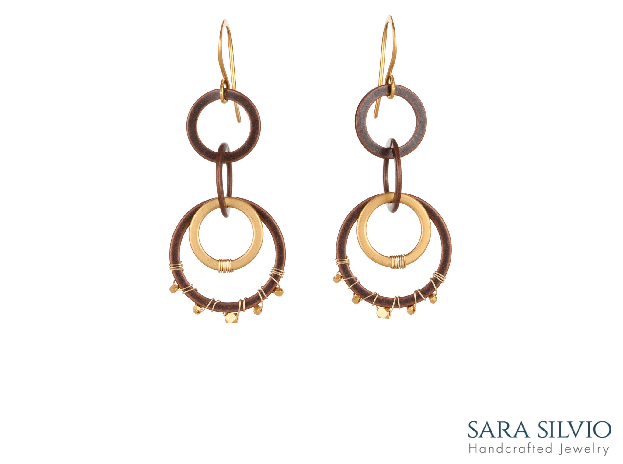 gold and copper circle dangle earrings