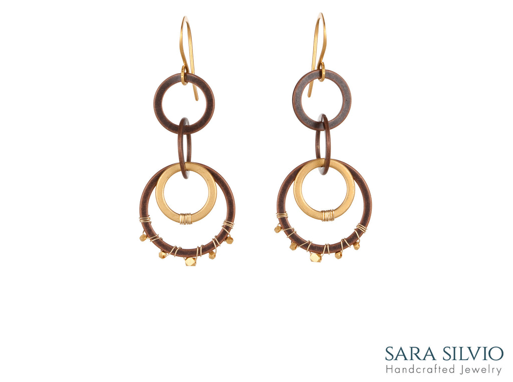 gold and copper circle dangle earrings